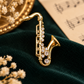 Gold Alto Saxophone Pin with Rhinestones