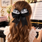 Black and White Piano Bow Clip