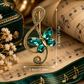 Sundry & Sound Co -Antique Gold and Green Butterfly Treble Clef Brooch