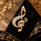 Sundry & Sound Co - Large Gilded Gold and Rhinestone Treble Clef Brooch 6cm