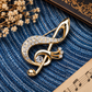 Sundry & Sound Co - Large Gilded Gold and Rhinestone Treble Clef Brooch 6cm