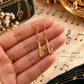Sundry & Sound Co - Mini Gold Saxophone Dangle Earrings (2cm)
