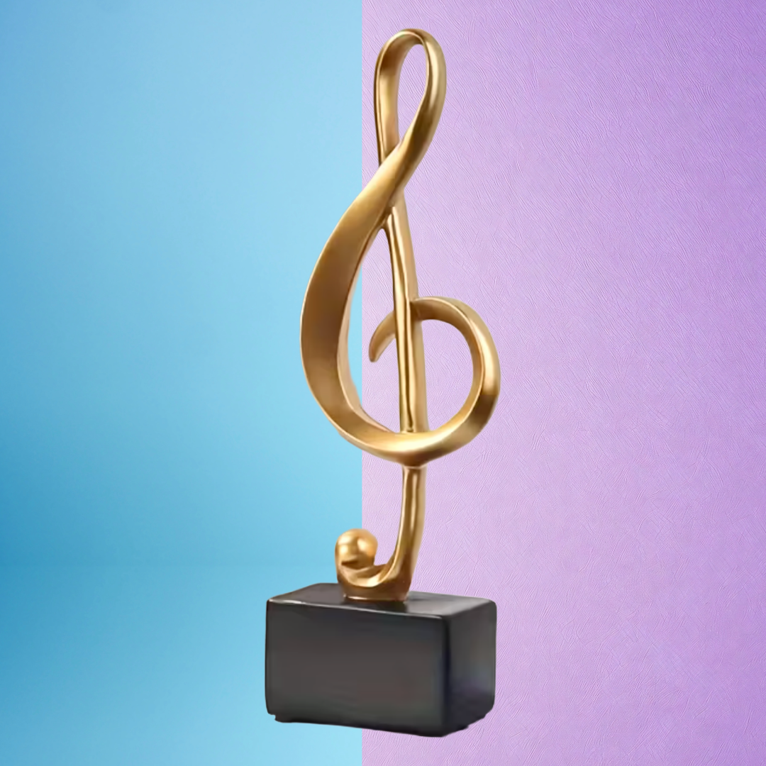 Large Golden Treble Clef Musical Note Statue on Black Base