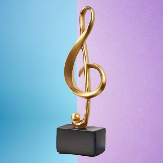 Large Golden Treble Clef Musical Note Statue on Black Base