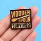 Wooden Spoon Survivor - Funny Enamel Lapel Pin